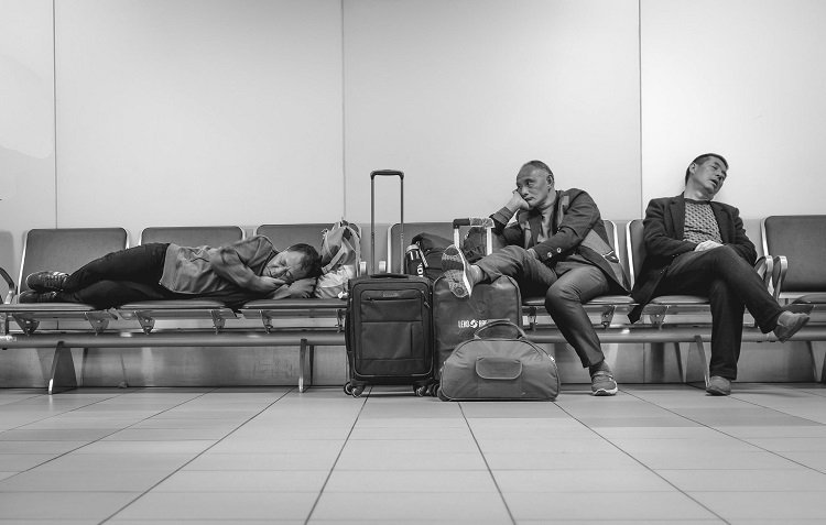waiting-airport-old-sleep