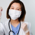 woman-doctor-wearing-mask-and-smile-to-fight-the-disease-as-covid19-corona-virus-and-influenza