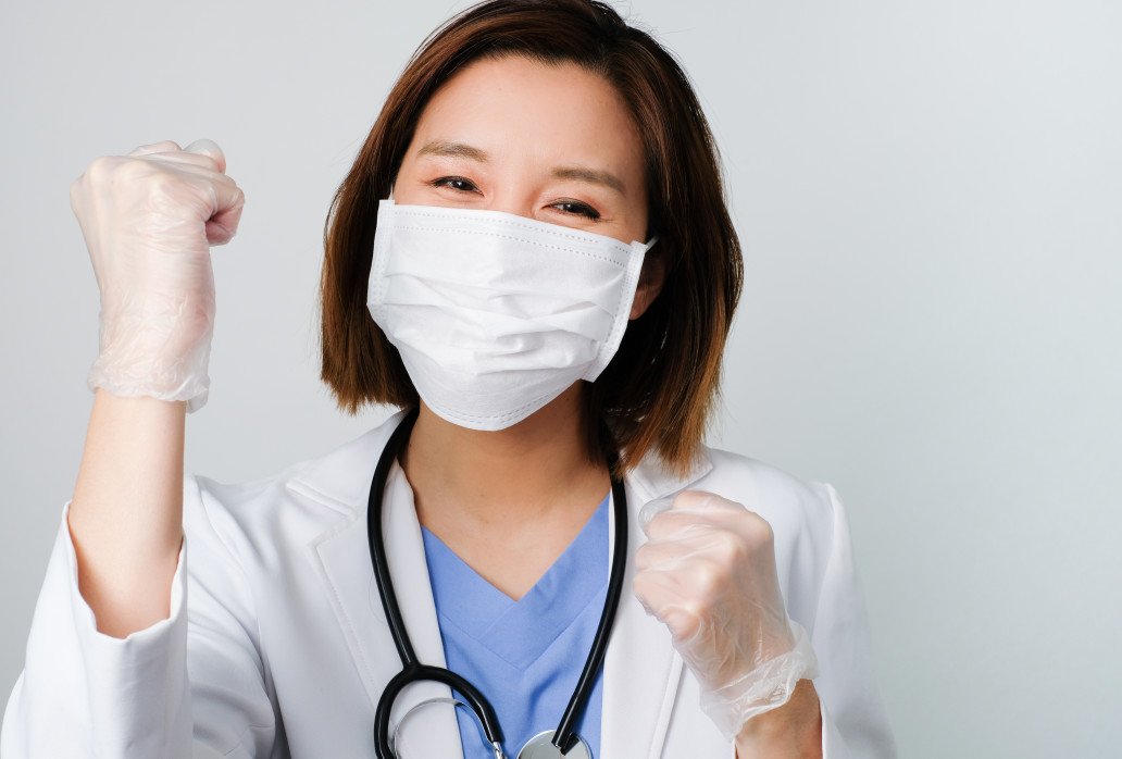 woman-doctor-wearing-mask-and-smile-to-fight-the-disease-as-covid19-corona-virus-and-influenza