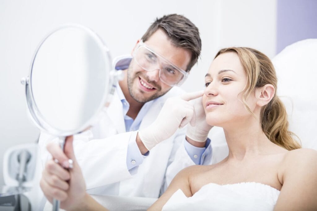 aesthetic-surgery-woman-looking-in-mirror