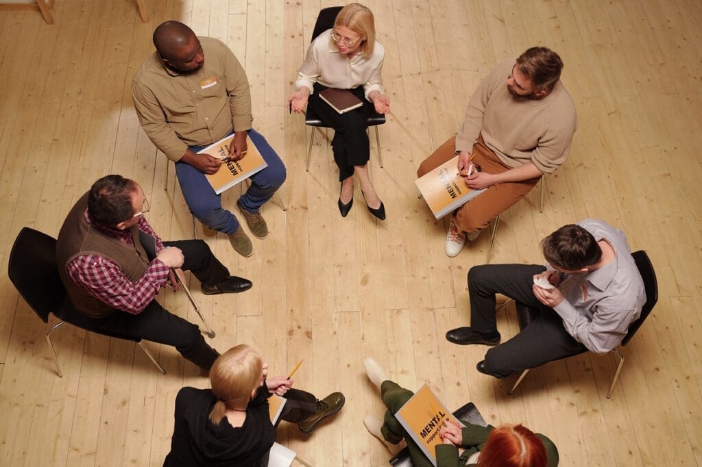 above-view-of-several-patients-talking-to